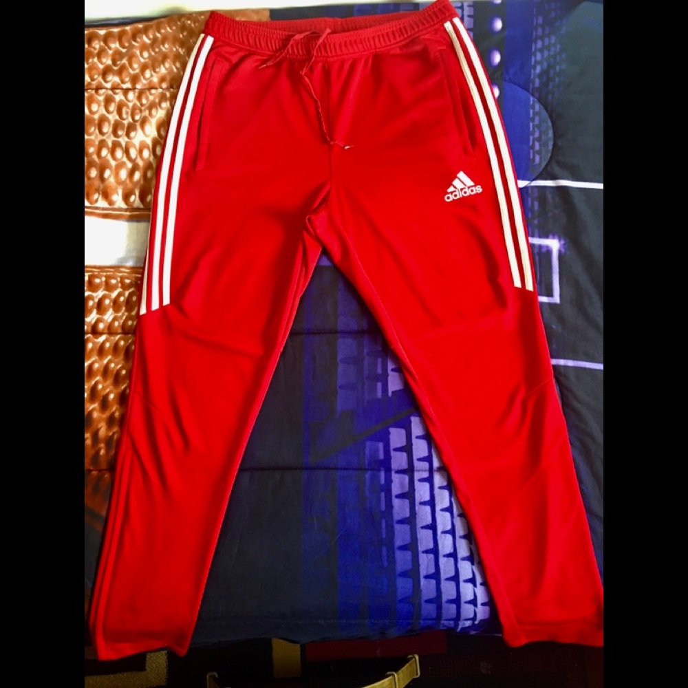 Red Adidas track pants